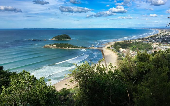 Mount Maunganui main beach in the Bay of Plenty on a sunny day