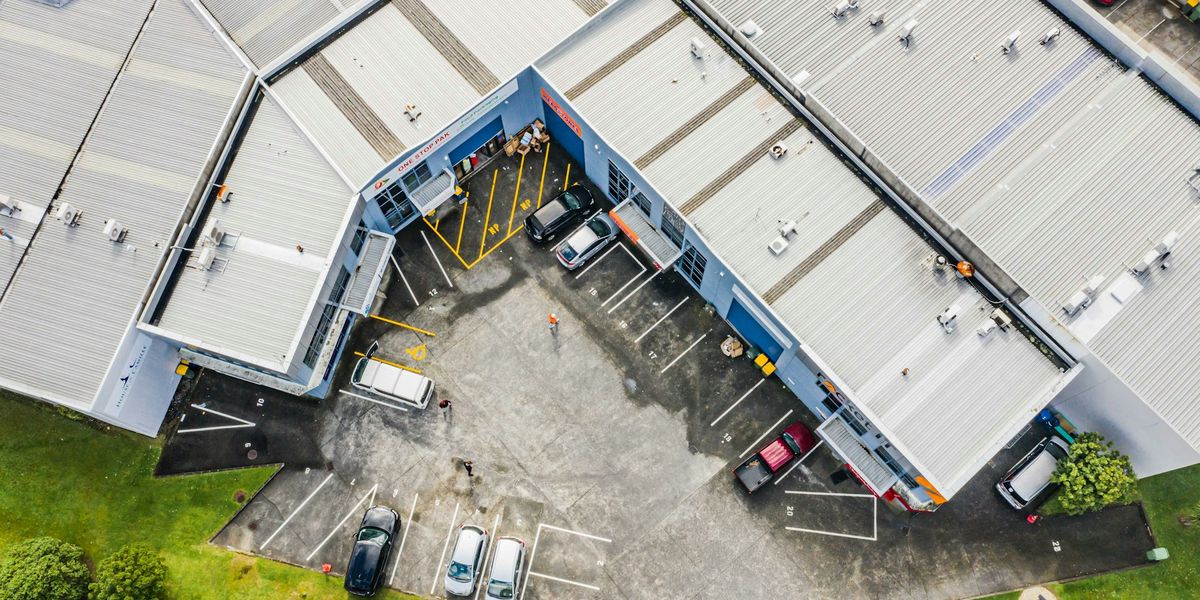 Aerial view of an office and warehouse complex in Rosedale, Auckland